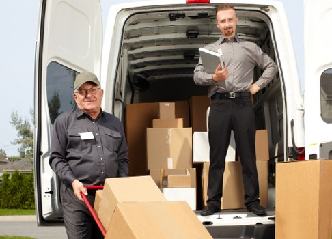 Professional flat removals team planning a move in Rainham