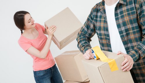 Home moving and storage solution for Rainham residents with packed boxes