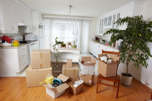 Employee moving items carefully in a self storage area