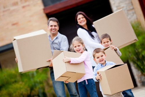 Apartment moving boxes and furniture being prepared for flat removals