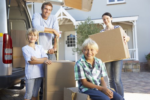 Local house removals in Rainham with a moving van and furniture loading