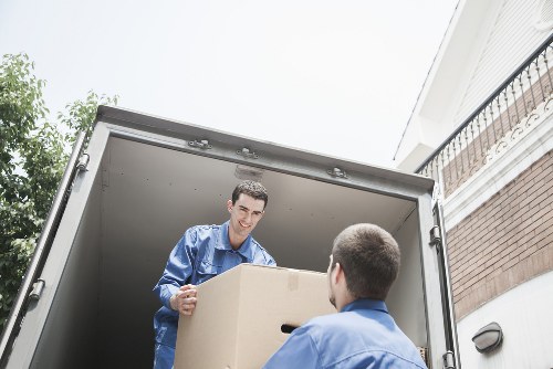 Professional movers handling furniture during a local move in Rainham